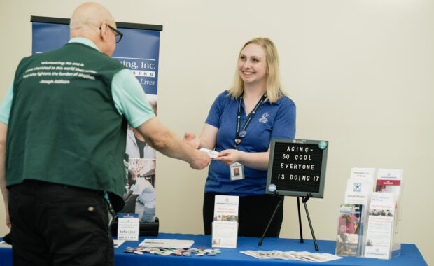 area agency on aging employee shares resources with community member