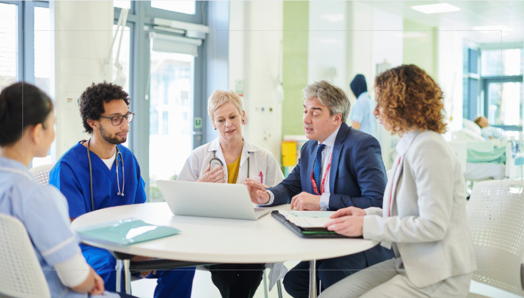 health care professionals meeting around a table