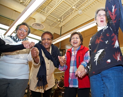 A group of four women celebrate