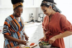 Two women cooking